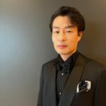 吉岡睦雄 経歴