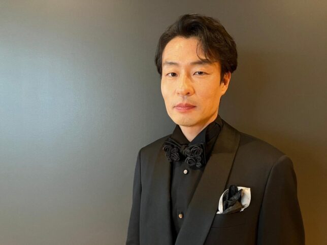 吉岡睦雄 経歴